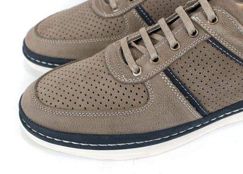 Детайлен изглед на перфорацията и връзките – визонено и тъмносиньо