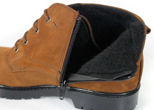 Brown women's Clarks boots with rugged winter outsole