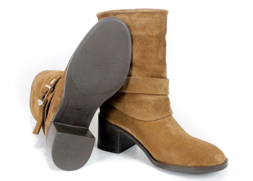 Light brown suede women's boots with decorative buckle and relaxed shaft